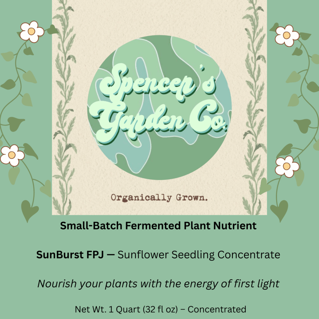 Bottle of SunBurst FPJ natural plant nutrient placed in a lush garden with sunflower seedlings.